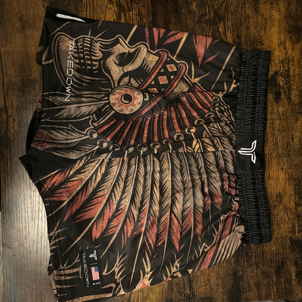 Takedown fight shorts. Brand new. They run small.
